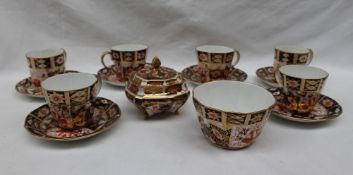 A Royal Crown Derby 2451 pattern part tea and coffee set, comprising a sugar box and cover,