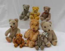 Eight miniature teddy bears,