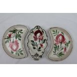 A pair of Llanelly pottery kidney shaped Persian Rose decorated dishes, 22.