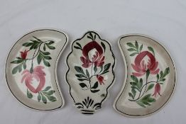 A pair of Llanelly pottery kidney shaped Persian Rose decorated dishes, 22.