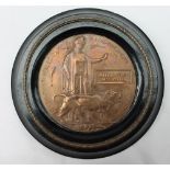 A World War I bronze penny 'Death Plaque' issued to 'William Percy Ness-Walker',