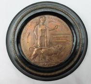 A World War I bronze penny 'Death Plaque' issued to 'William Percy Ness-Walker',