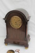 A Victorian mahogany mantle clock,