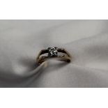 A solitaire diamond ring the round old cut stone approximately 0.