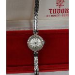 A lady's 9ct white gold Tudor by Rolex wristwatch, the silvered dial with batons,