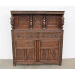 A 17th century style oak court cupboard,