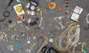 Assorted costume jewellery including faux pearls, wristwatches, rings, bangles,