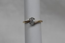 A solitaire diamond ring, the oval faceted diamond approximately 0.