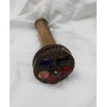 A brass kaleidoscope, with a brass viewing tube,