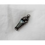 Egyptian style white metal and enamel sarcophagus shaped hinged pendant, with enamel decoration,