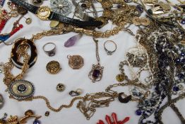 Assorted costume jewellery including bracelets, necklaces, brooches,