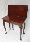 A 19th century mahogany tea table,