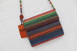 A 1980's Missoni handbag, with tradmark wave pattern in plastics coloured greens, blues and oranges,