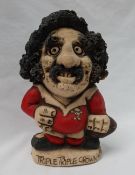 A John Hughes pottery Grogg of a Welsh Rugby player with number 1 on his shirt holding a ball in