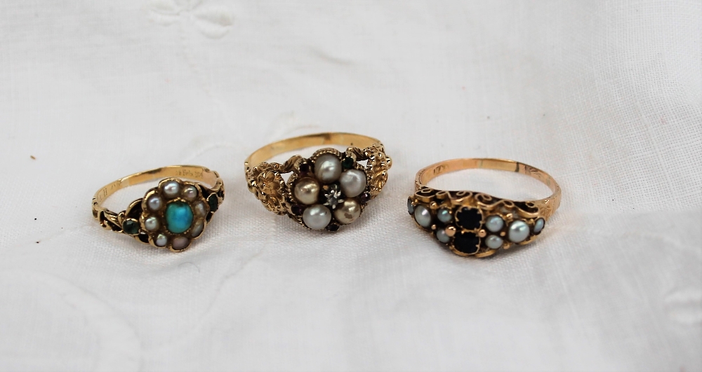 A pearl and turquoise set ring,