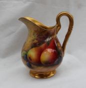 A Royal Worcester porcelain milk jug,