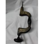 A brass framed ebony brace stamped "Henry Pasley's own manufacture The Ne Plus Ultra framed brace,