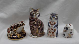 A Royal Crown Derby paperweight in the form of a dormouse together with three other Royal Crown