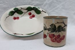 A South Wales Pottery water basin, painted with cherries on a branch to a green line border,