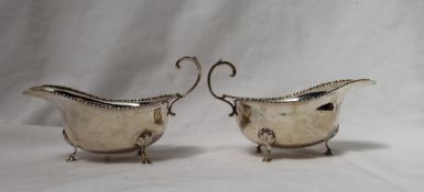 A pair of George V silver sauce boats,