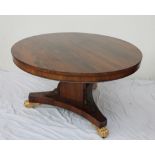 An early Victorian rosewood supper table,