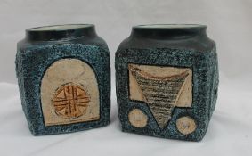 A pair of Troika pottery square vases,