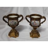 A pair of 19th century continental porcelain and ormolu mounted twin handled vases,