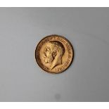 A George V gold half sovereign,