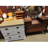 A 20th century oak dressing table together with a painted chest of drawers