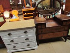 A 20th century oak dressing table together with a painted chest of drawers