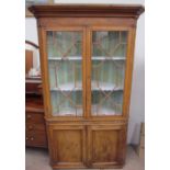 A George III oak standing corner cupboard,