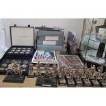 A collection of Royal Hampshire military models together with Westminster coins,