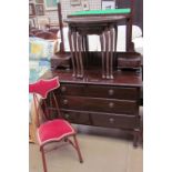 A 20th century mahogany dressing table together with a nest of tables and a bedroom chair