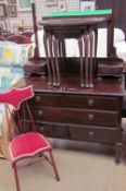 A 20th century mahogany dressing table together with a nest of tables and a bedroom chair