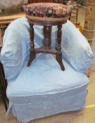 A 19th century upholstered tub chair together with a piano stool with pad seat and turned legs