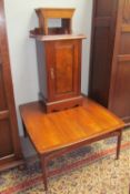 A square teak coffee table together with a walnut bedside cabinet and a low stool