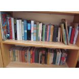 A collection of books including the Living Planet, reference books, history books,