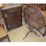 An 18th century oak hanging corner cupboard together with a 19th century oak tripod table