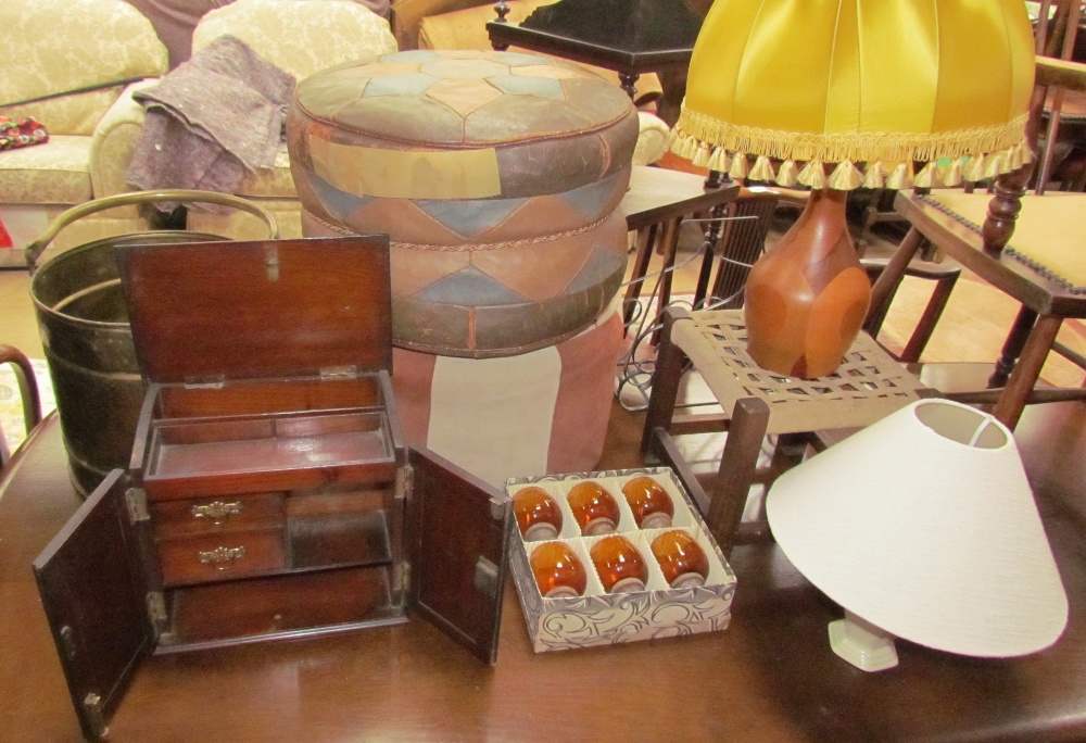 An oak pipe cabinet with drawers together with a brass coal bucket, two pouffe's, a magazine rack,