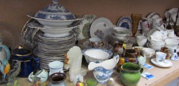 An Allertons blue and white part dinner set together with a Ewenny pottery jug, onyx figures,