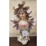 A Royal Dux portrait bust of a young lady in a frilly dress, raised triangle mark,