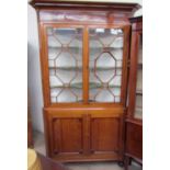 A George III corner cupboard,