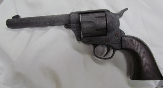 A replica Colt Single Action Army 45