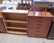 An Ercol bookcase together with a teak chest of drawers and a stool