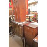 A 20th century mahogany drinks cabinet together with a pine cabinet and a mahogany music cabinet