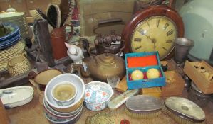 Silver backed clothes brushes together with chess sets, a postman clock, kettles,