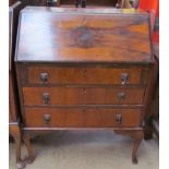 A 20th century walnut bureau