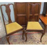 A set of four Queen Anne style mahogany dining chairs