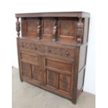 A 17th century style oak court cupboard,