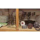 An Egyptian style door knocker together with a pair of electroplated candlesticks,
